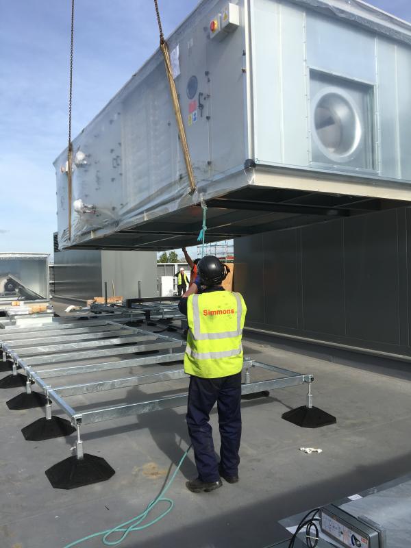 AHU hoist onto roof with 200te crane