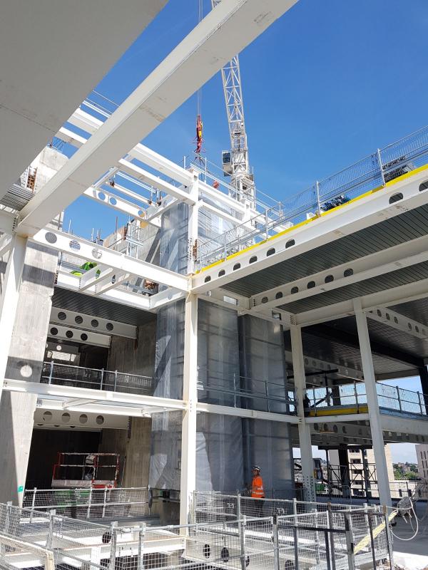 Fixing riser within steel framework