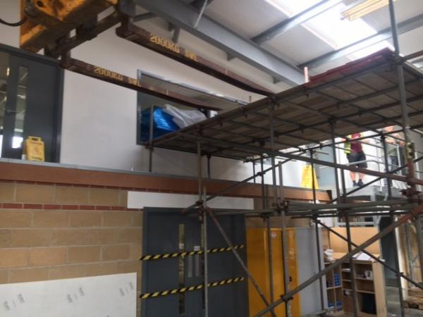Hole cut by client to allow access